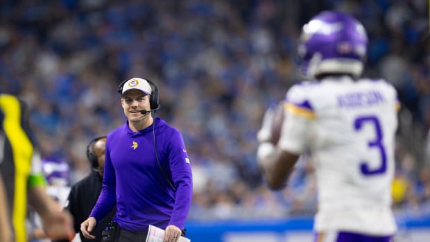 Minnesota Vikings head coach Kevin O'Connell, with wide receiver Jordan Addison in the foreground.